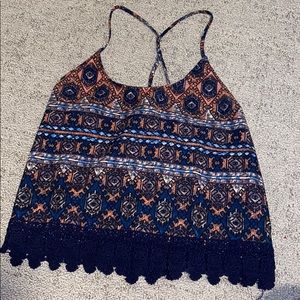 Cross back lace bottom tank